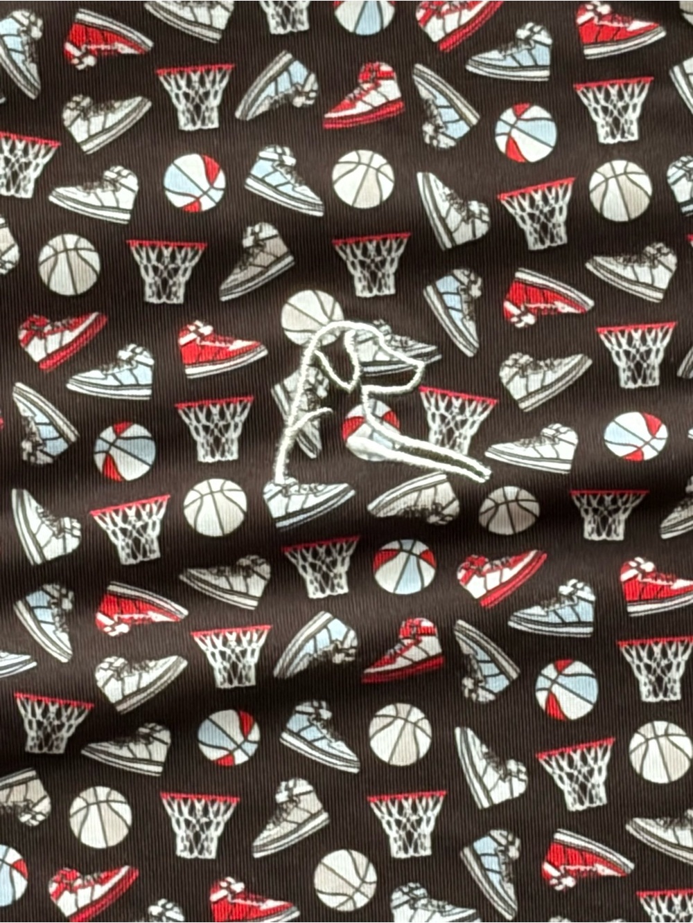 Men’s basketball-themed golf shirt from Rhoback